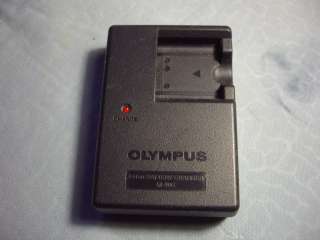 Зарядное устройство предназначен для фотоаппаратов OLYMPUS